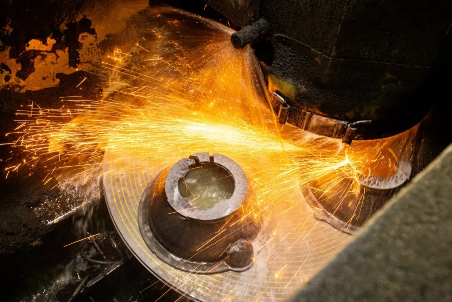 Grinder-min A grinder throwing sparks, CNC lathes & mills fabricating