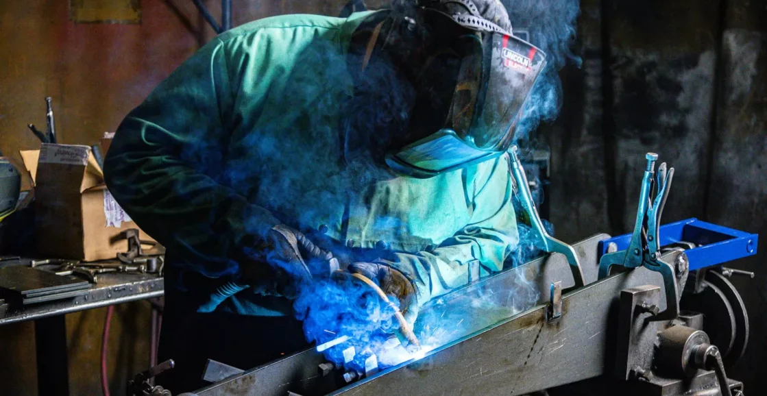 Man welding in welding mask