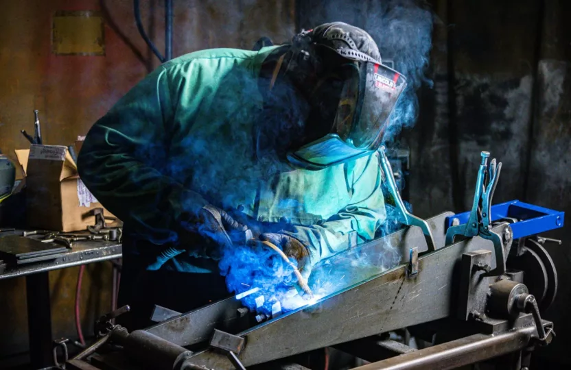 Man welding in welding mask